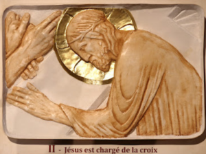 II - Jésus est chargé de la croix